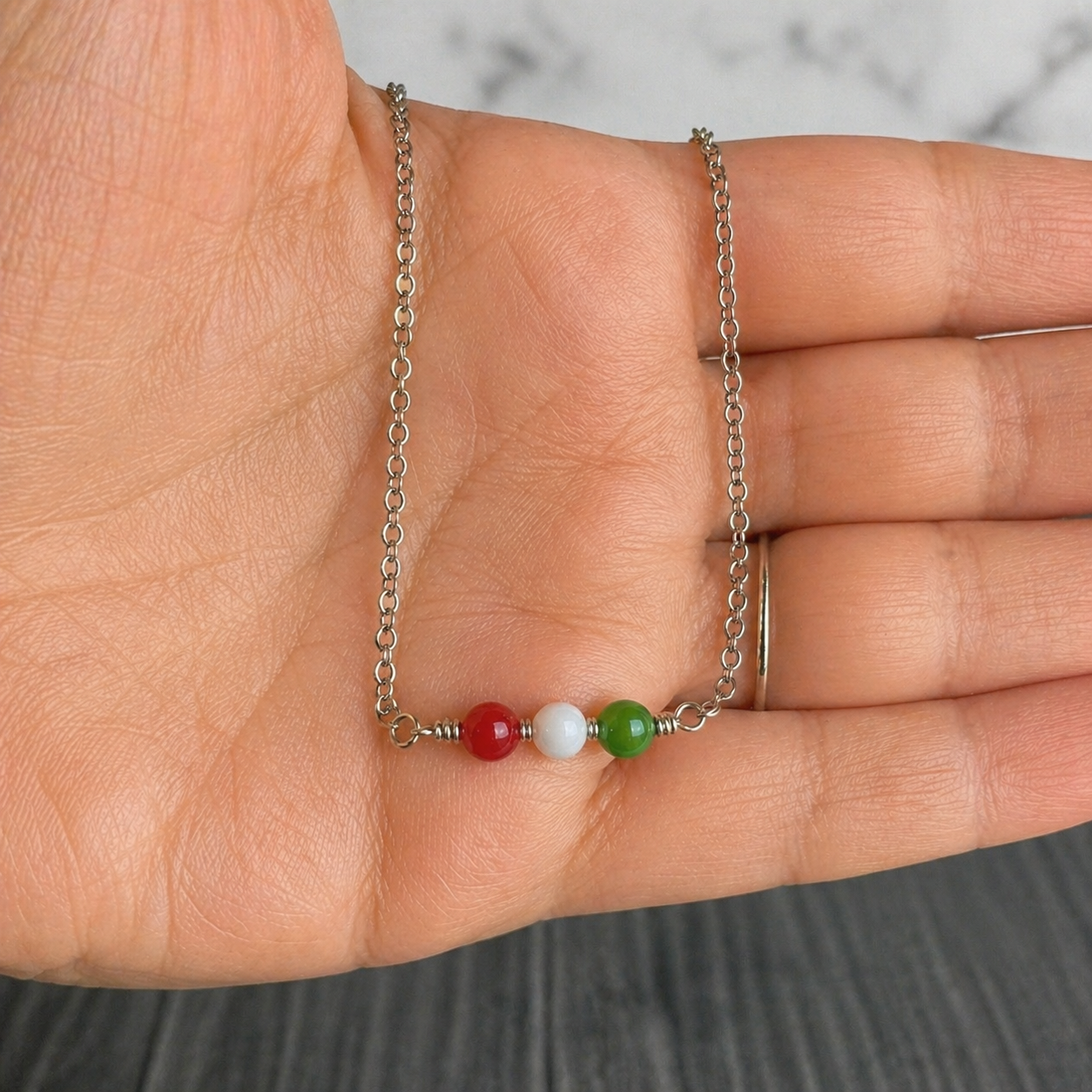 Christmas Spirit Necklace - Beaded necklace with red, white and green pearls